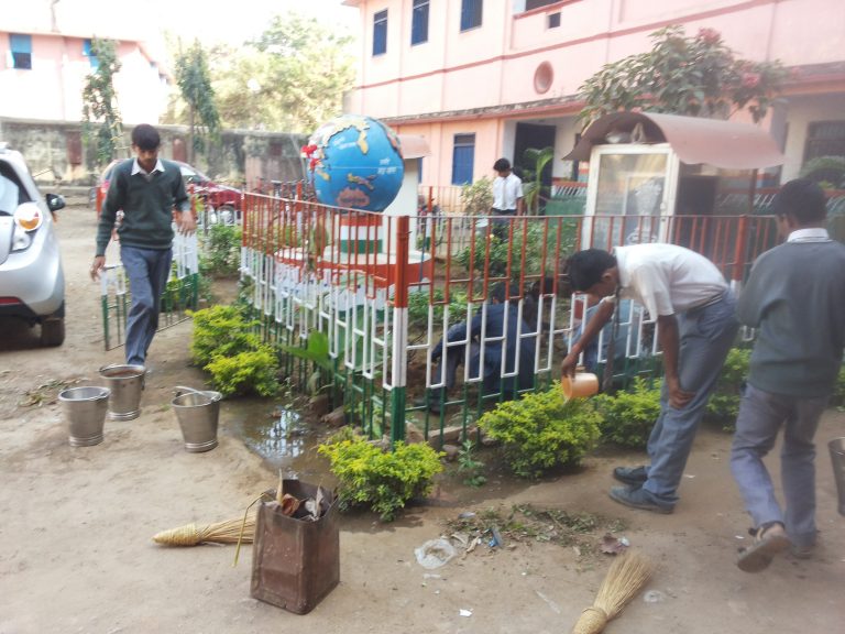 students taking care of school park