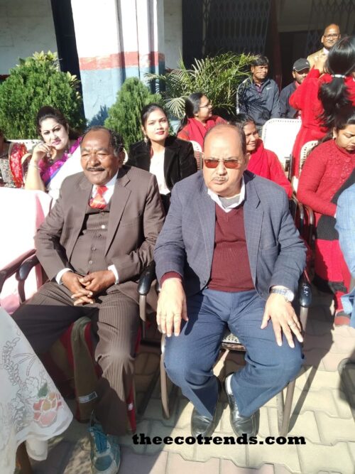 Teachers sitting to see a school programme