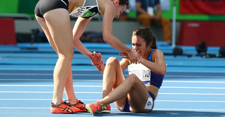 A PLAYER IS HELPING THE OTHER