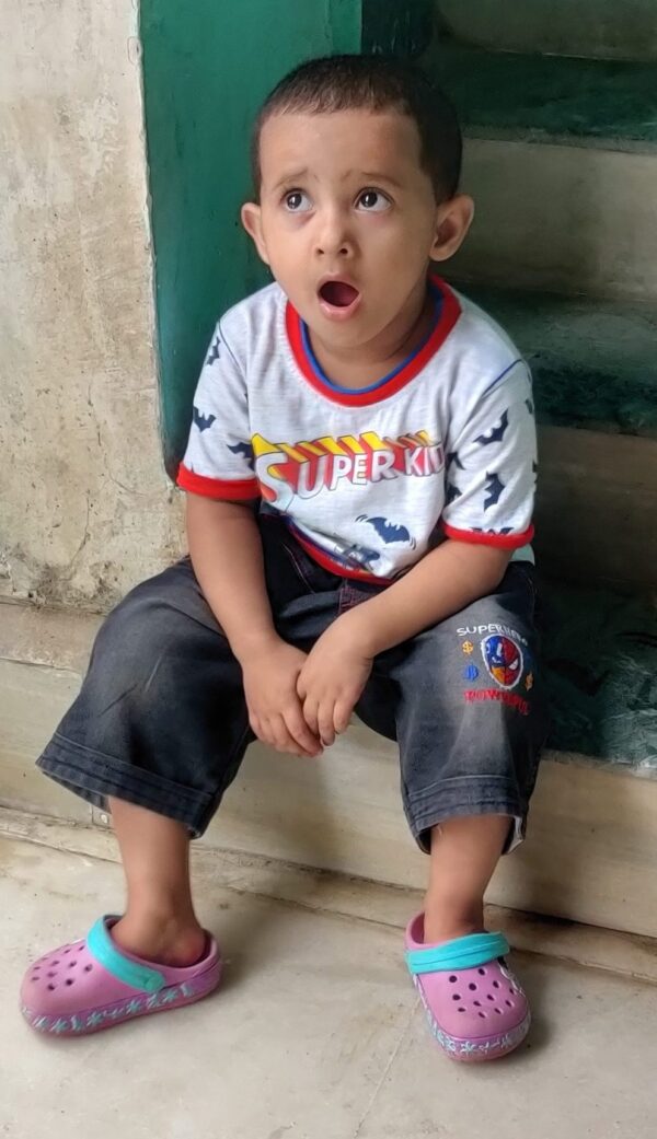 Aadya sitting on stairs