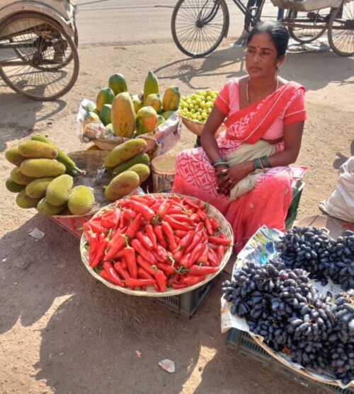 A woman selling vegetable